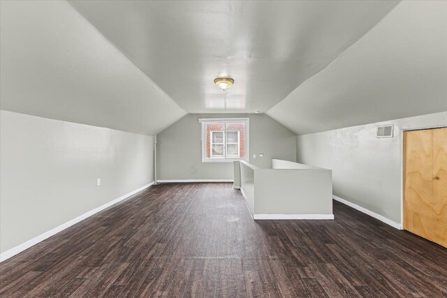 6905 Archdale St, Detroit, MI 48228 - bonus room featuring wood finished floors, baseboards, and vaulted ceiling