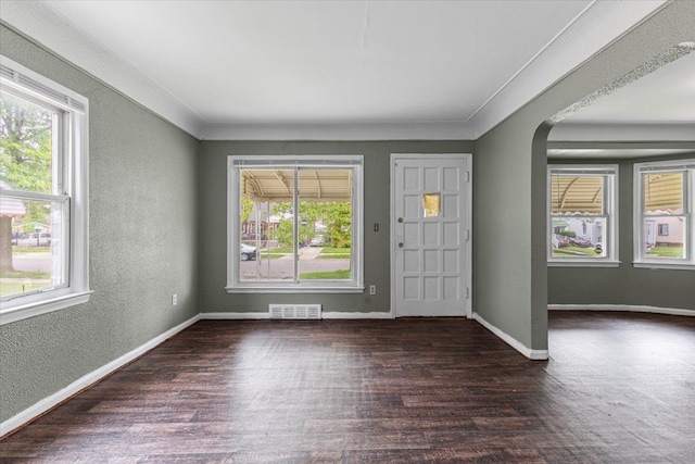 6905 Archdale St, Detroit, MI 48228 - entrance foyer with a textured wall, plenty of natural light, wood finished floors, and baseboards