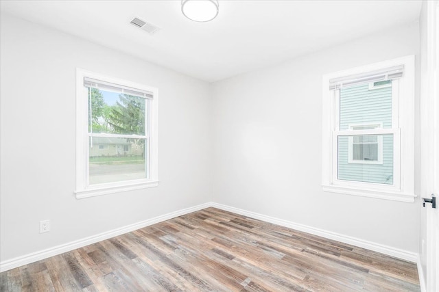 15016 Sunbury St, Livonia, MI 48154 - unfurnished room with wood finished floors and baseboards