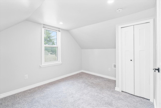 15016 Sunbury St, Livonia, MI 48154 - bonus room featuring carpet floors, vaulted ceiling, baseboards, and recessed lighting