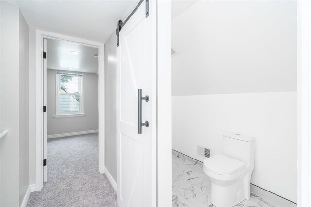 15016 Sunbury St, Livonia, MI 48154 - bathroom featuring toilet, baseboards, and marble look tile flooring