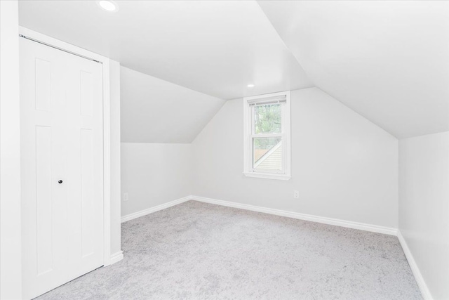 15016 Sunbury St, Livonia, MI 48154 - bonus room featuring carpet, lofted ceiling, baseboards, and recessed lighting