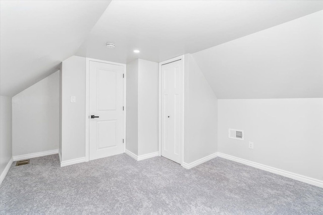 15016 Sunbury St, Livonia, MI 48154 - bonus room with carpet flooring, vaulted ceiling, recessed lighting, and baseboards