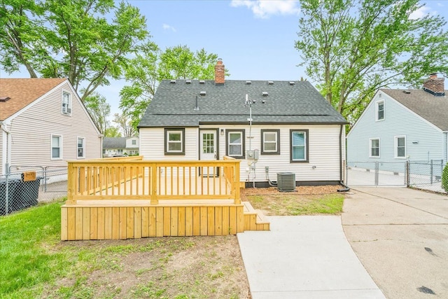 15016 Sunbury St, Livonia, MI 48154 - rear view of house featuring a gate, a deck, a chimney, central AC unit, and roof with shingles