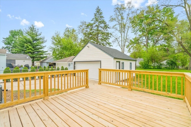 15016 Sunbury St, Livonia, MI 48154 - wooden deck featuring a detached garage and an outbuilding