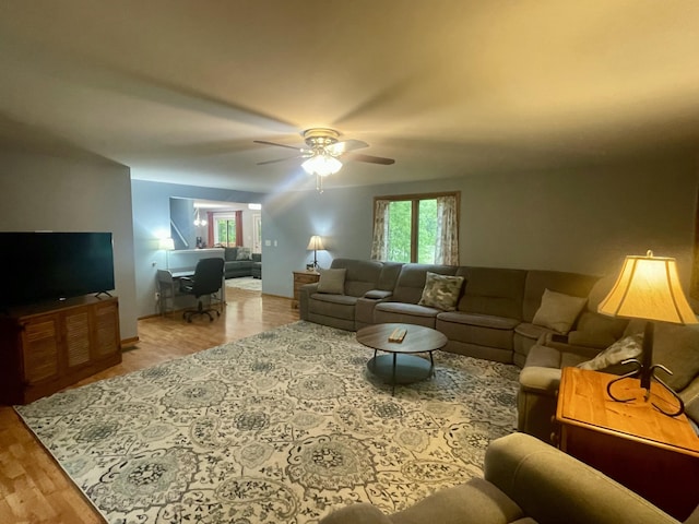 19490 Island Lake Rd, Chelsea, MI 48118 - living area with a ceiling fan and wood finished floors