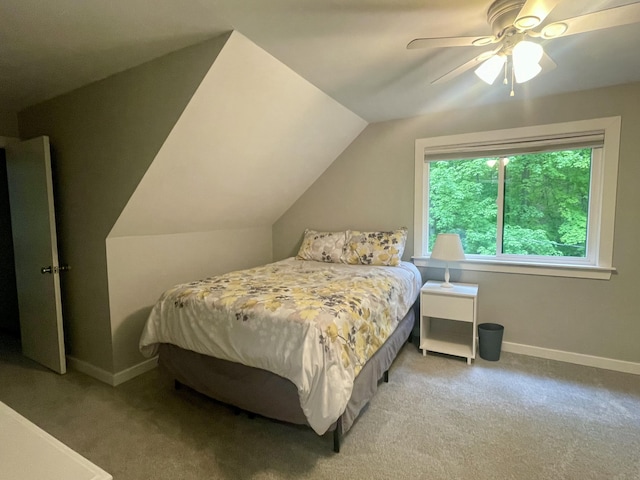 19490 Island Lake Rd, Chelsea, MI 48118 - carpeted bedroom featuring a ceiling fan, vaulted ceiling, and baseboards