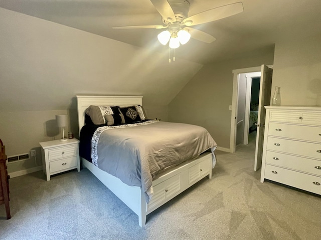 19490 Island Lake Rd, Chelsea, MI 48118 - bedroom with light carpet, vaulted ceiling, baseboards, and a ceiling fan