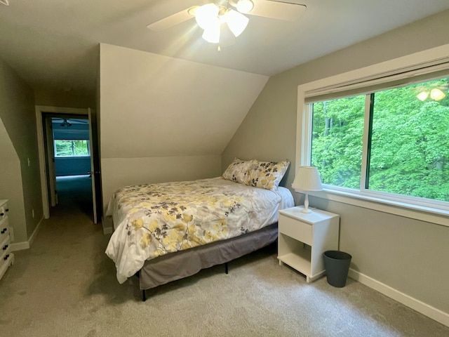 19490 Island Lake Rd, Chelsea, MI 48118 - bedroom with multiple windows, carpet, vaulted ceiling, and baseboards