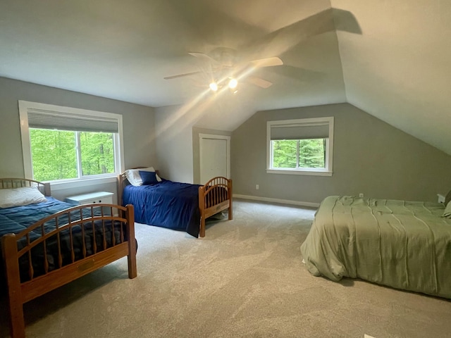 19490 Island Lake Rd, Chelsea, MI 48118 - bedroom with carpet flooring, a ceiling fan, lofted ceiling, and baseboards