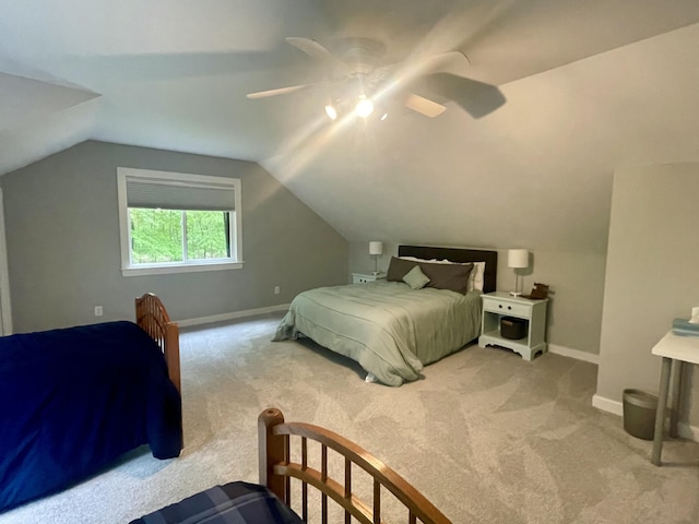 19490 Island Lake Rd, Chelsea, MI 48118 - carpeted bedroom with baseboards, vaulted ceiling, and a ceiling fan