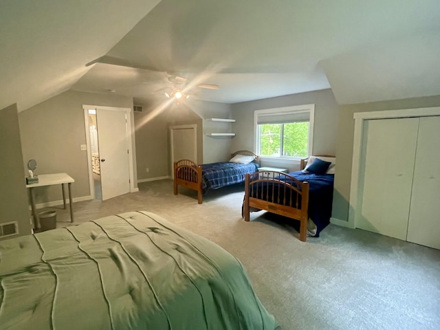 19490 Island Lake Rd, Chelsea, MI 48118 - bedroom with carpet flooring, a ceiling fan, a closet, lofted ceiling, and baseboards
