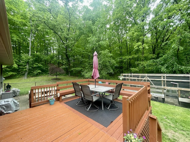 19490 Island Lake Rd, Chelsea, MI 48118 - wooden terrace with outdoor dining space