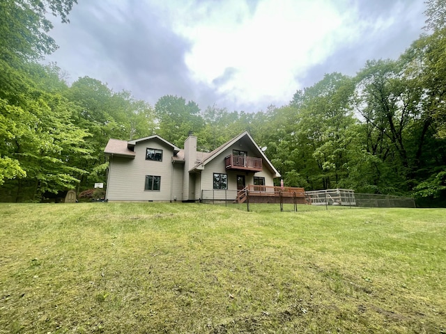 19490 Island Lake Rd, Chelsea, MI 48118 - back of house featuring a yard, a wooden deck, a chimney, and a forest view