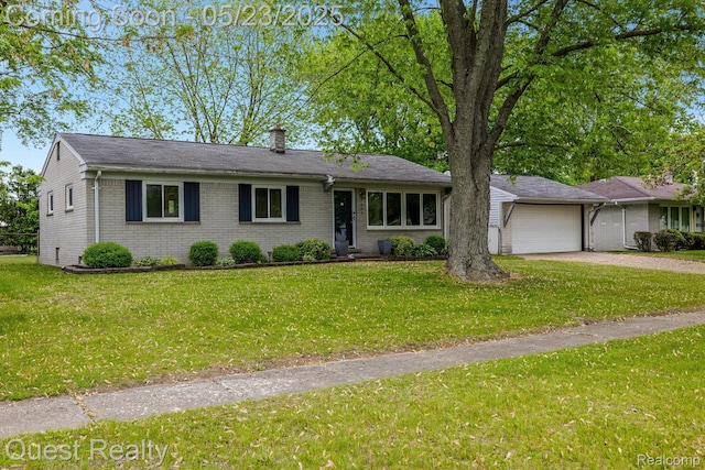 3680 Shoals St, Waterford, MI 48329 - view of front facade featuring brick siding, driveway, a front lawn, and a chimney