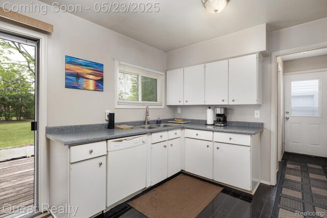 3680 Shoals St, Waterford, MI 48329 - kitchen featuring white dishwasher, a sink, dark countertops, white cabinets, and dark wood-type flooring