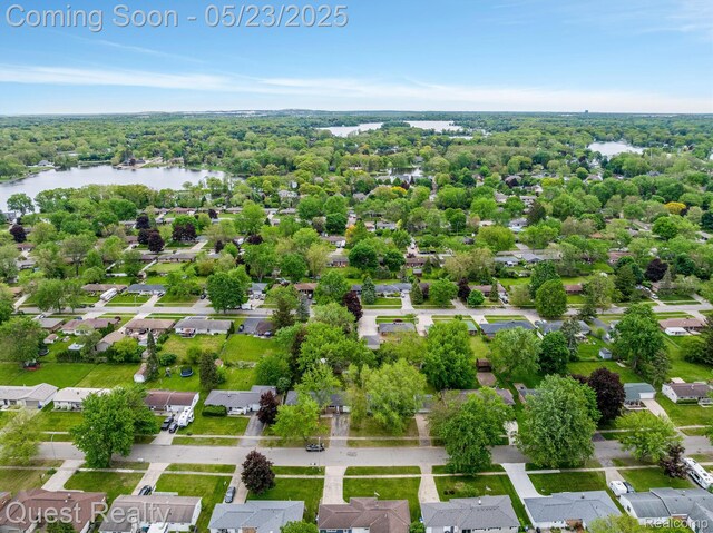 3680 Shoals St, Waterford, MI 48329 - aerial perspective of suburban area featuring a large body of water