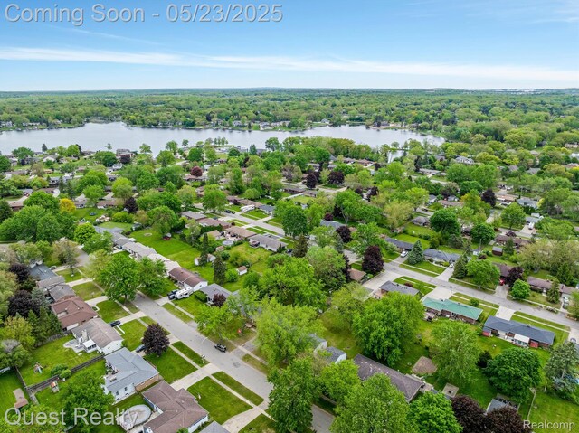 3680 Shoals St, Waterford, MI 48329 - aerial view of residential area with a large body of water and a forest