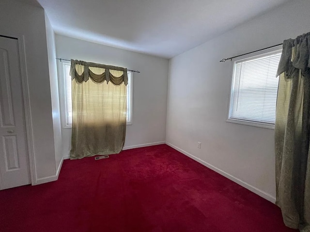 8056 Fisher Ave, Warren, MI 48089 - empty room featuring carpet floors and baseboards