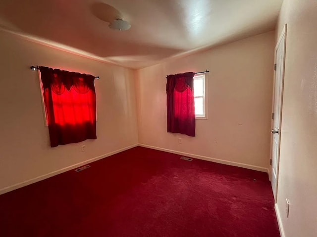 8056 Fisher Ave, Warren, MI 48089 - empty room with dark colored carpet and baseboards