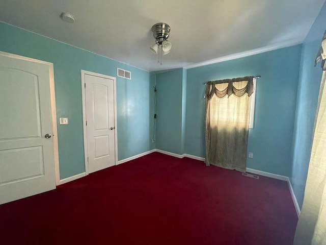 8056 Fisher Ave, Warren, MI 48089 - spare room with baseboards, carpet floors, a smoke detector, and a ceiling fan