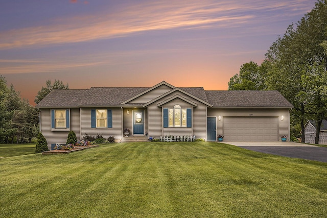 12697 Lindy Anne Ct NE, Cedar Springs, MI 49319 - single story home with an attached garage, asphalt driveway, a lawn, and a shingled roof
