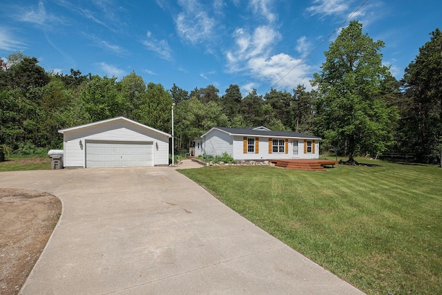 4171 E 124th St, Grant, MI 49327 - single story home featuring a garage, an outdoor structure, a front lawn, and a wooden deck