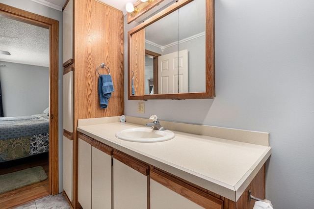 4171 E 124th St, Grant, MI 49327 - bathroom featuring ornamental molding, vanity, a textured ceiling, and ensuite bathroom