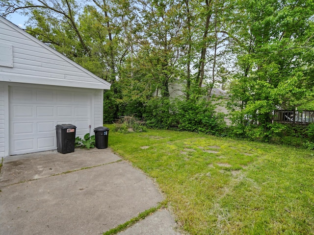 18914 Elkhart, Harper Woods, MI 48225 - view of green lawn with a garage and driveway