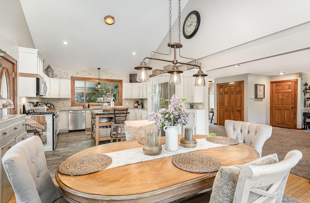 5511 Westside Dr, Alger, MI 48610 - dining room featuring recessed lighting and wood finished floors