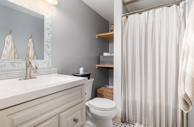 5511 Westside Dr, Alger, MI 48610 - full bathroom with toilet, vanity, tasteful backsplash, and a shower with curtain