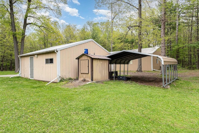 5511 Westside Dr, Alger, MI 48610 - view of shed featuring a carport