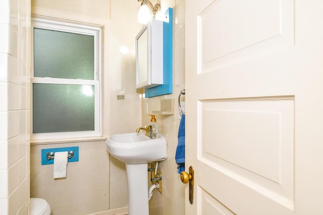 bathroom featuring toilet