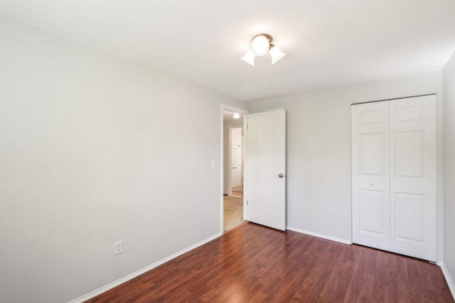 2761 Deake Ave, Ann Arbor, MI 48108 - unfurnished bedroom featuring wood finished floors and baseboards