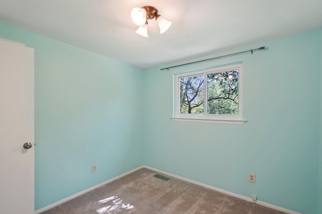 2761 Deake Ave, Ann Arbor, MI 48108 - empty room with baseboards and carpet floors