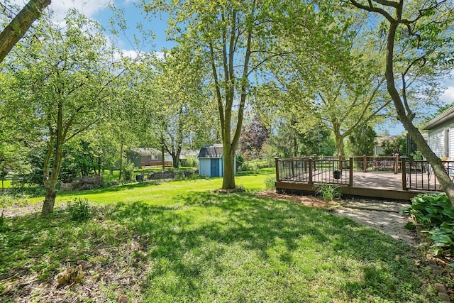 2761 Deake Ave, Ann Arbor, MI 48108 - view of green lawn featuring a deck