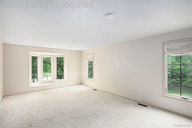 7254 Dark Lake Dr, Clarkston, MI 48346 - unfurnished room featuring carpet floors and a smoke detector