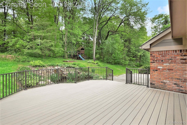 7254 Dark Lake Dr, Clarkston, MI 48346 - wooden terrace with a playground and a yard