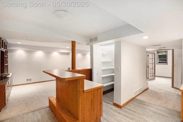 7254 Dark Lake Dr, Clarkston, MI 48346 - indoor dry bar featuring baseboards, light wood-style flooring, recessed lighting, and light colored carpet