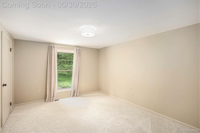 7254 Dark Lake Dr, Clarkston, MI 48346 - carpeted empty room featuring baseboards
