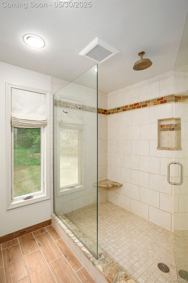 7254 Dark Lake Dr, Clarkston, MI 48346 - full bathroom with a shower stall, wood finish floors, and baseboards