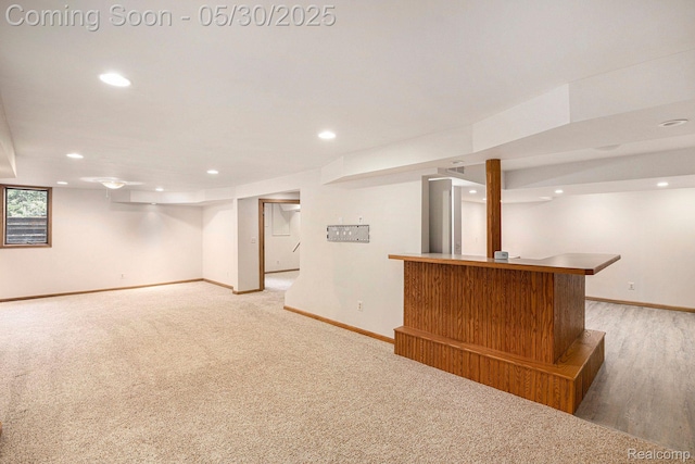 7254 Dark Lake Dr, Clarkston, MI 48346 - basement with bar area, baseboards, recessed lighting, and light colored carpet