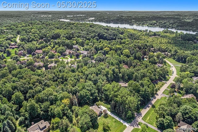 7254 Dark Lake Dr, Clarkston, MI 48346 - bird's eye view of a nearby body of water and a heavily wooded area
