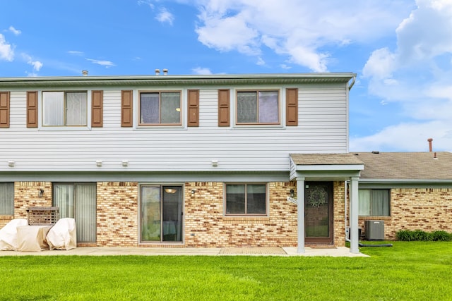 50102 S Angelo, Chesterfield, MI 48047 - back of house featuring brick siding, a lawn, and cooling unit