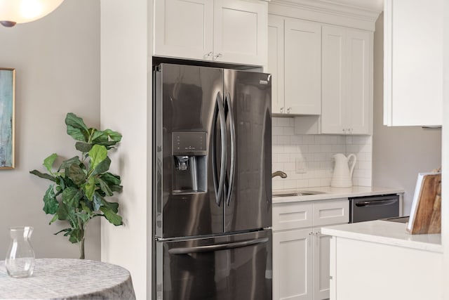 50102 S Angelo, Chesterfield, MI 48047 - kitchen featuring stainless steel fridge, tasteful backsplash, a sink, dishwashing machine, and white cabinetry