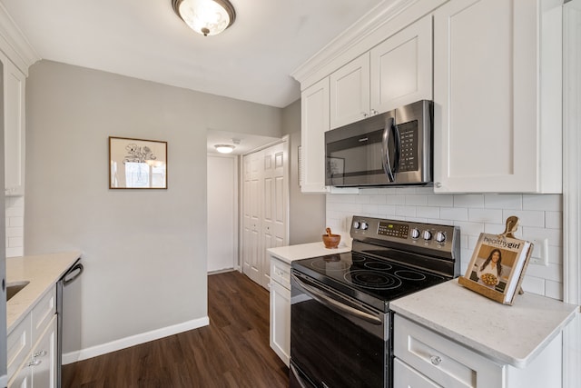 50102 S Angelo, Chesterfield, MI 48047 - kitchen featuring stainless steel appliances, tasteful backsplash, dark wood-style flooring, baseboards, and light stone counters