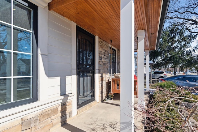 1826 Morris Ave, Lincoln Park, MI 48146 - property entrance featuring covered porch and stone siding