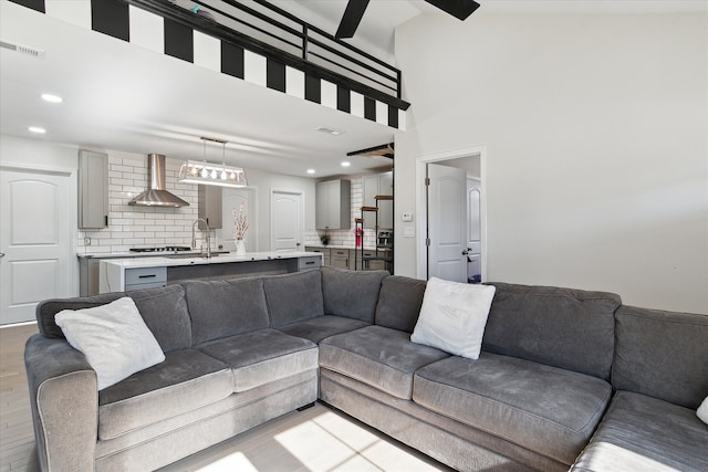 1826 Morris Ave, Lincoln Park, MI 48146 - living area featuring light wood-type flooring and recessed lighting