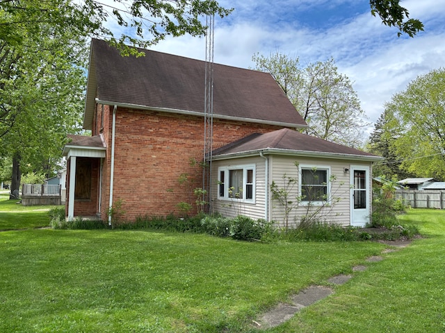 3927 W Sheldon Rd, Carsonville, MI 48419 - view of side of property featuring brick siding and a shingled roof