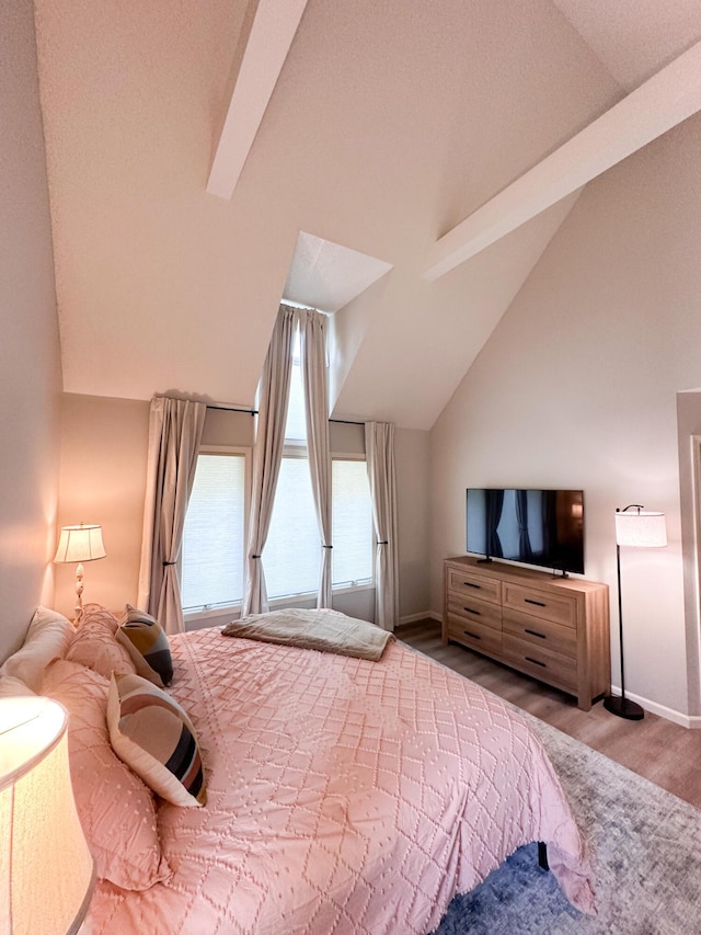 130 N Shore Dr Unit 8, South Haven, MI 49090 - bedroom featuring wood finished floors and baseboards
